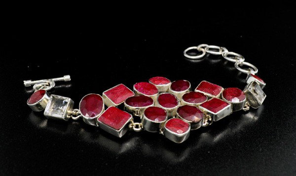 APP: 23k 82.74CT Ruby & Sterling Silver Bracelet: 82.74CT Ruby and Sterling Silver Bracelet - Appraisal Value: $22.9K - Bid with utmost confidence from GovernmentAuction.com. We have been in business for over 35 years, and pride ourselves on perfect 