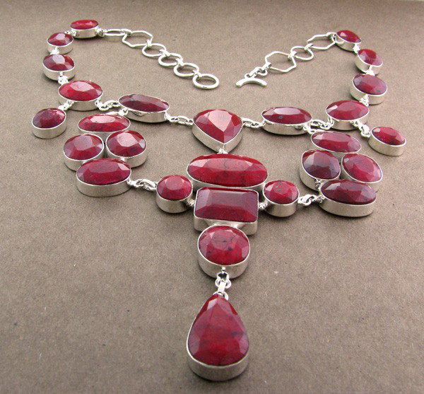APP: 51.6k 262.08CT Ruby & Sterling Silver Necklace: 262.08CT Ruby and Sterling Silver Necklace - Appraisal Value: $51.6K - Bid with utmost confidence from GovernmentAuction.com. We have been in business for over 35 years, and pride ourselves on perfect