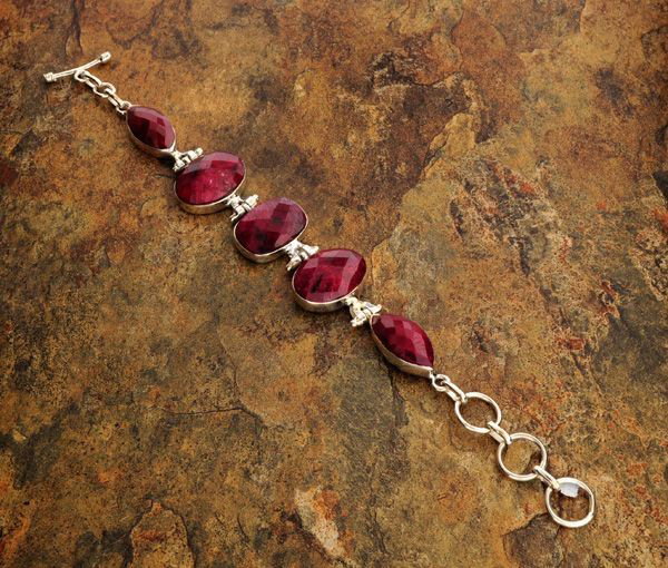 APP: 17.9k 64.44CT Ruby & Sterling Silver Bracelet: 64.44CT Ruby and Sterling Silver Bracelet - Appraisal Value: $17.8K - Bid with utmost confidence from GovernmentAuction.com. We have been in business for over 35 years, and pride ourselves on perfect 