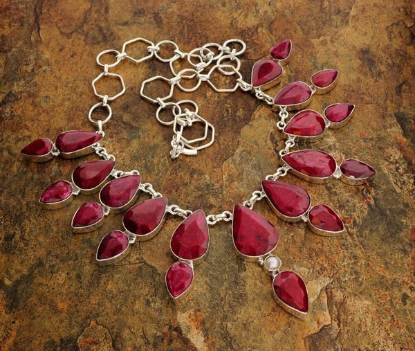 APP: 35.6k 247.37CT Ruby & Sterling Silver Necklace: 247.37CT Ruby and Sterling Silver Necklace - Appraisal Value: $35.5K - Bid with utmost confidence from GovernmentAuction.com. We have been in business for over 35 years, and pride ourselves on perfect
