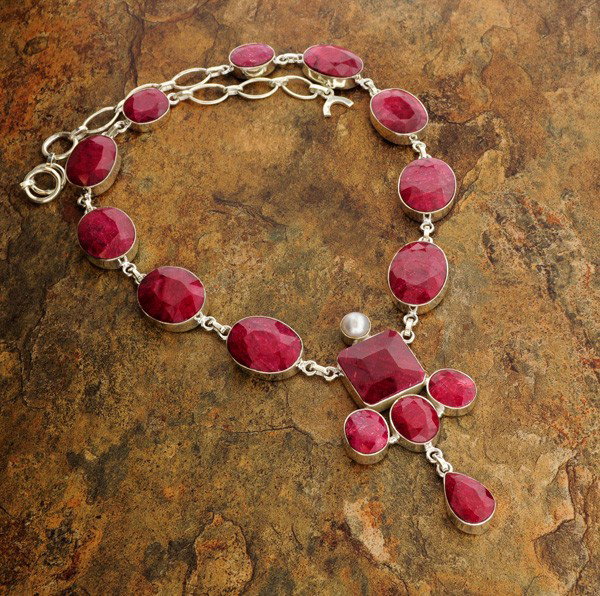 APP: 27.3k 188.46CT Ruby & Sterling Silver Necklace: 188.46CT Ruby and Sterling Silver Necklace - Appraisal Value: $27.2K - Bid with utmost confidence from GovernmentAuction.com. We have been in business for over 35 years, and pride ourselves on perfect