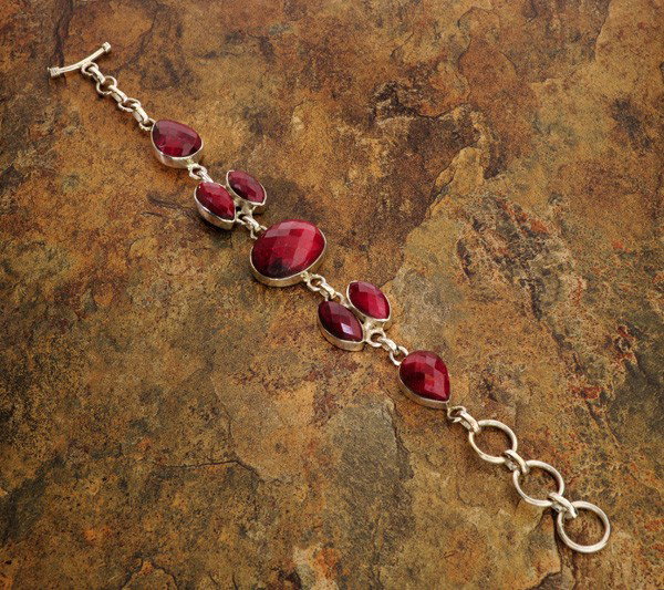APP: 14.4k 51.56CT Ruby & Sterling Silver Bracelet: 51.56CT Ruby and Sterling Silver Bracelet - Appraisal Value: $14.4K - Bid with utmost confidence from GovernmentAuction.com. We have been in business for over 35 years, and pride ourselves on perfect 