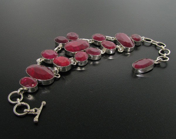 APP: 23.7k 94.42CT Ruby & Sterling Silver Bracelet: 94.42CT Ruby and Sterling Silver Bracelet - Appraisal Value: $23.6K - Bid with utmost confidence from GovernmentAuction.com. We have been in business for over 35 years, and pride ourselves on perfect 