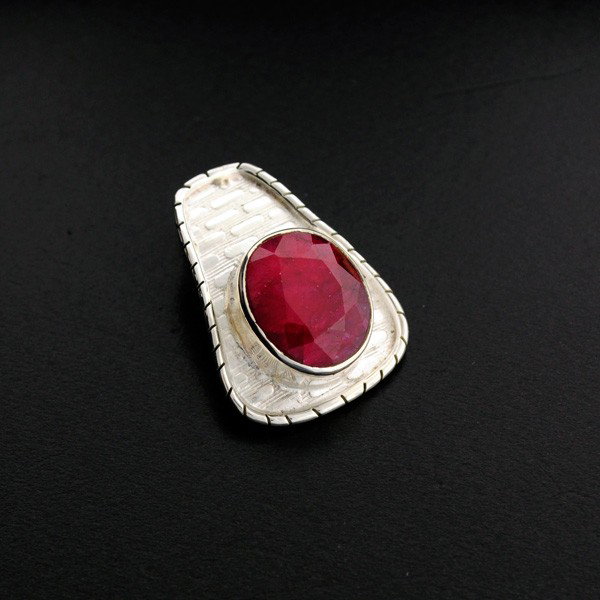 APP: 4.2k 10.78CT Ruby & Sterling Silver Pendant: 10.78CT Ruby and Sterling Silver Pendan - Appraisal Value: $4.2K - Bid with utmost confidence from GovernmentAuction.com. We have been in business for over 35 years, and pride ourselves on perfect cus