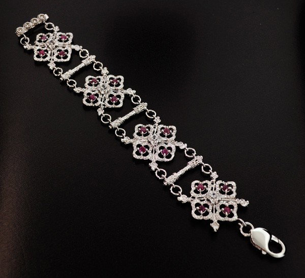 APP: 7k 3CT Ruby Platinum Sterling Silver Bracelet: 3.16CT Ruby Platinum Overlay Sterling Silver Bracelet - Appraisal Value: $7.2K - Bid with utmost confidence from GovernmentAuction.com. We have been in business for over 35 years, and pride ourselves 