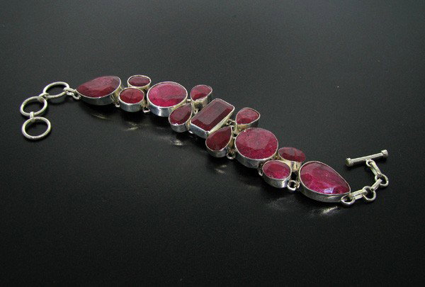 APP: 58.2k 112.18CT Ruby & Sterling Silver Bracelet: 112.18CT Ruby and Sterling Silver Bracelet - Appraisal Value: $58.2K - Bid with utmost confidence from GovernmentAuction.com. We have been in business for over 35 years, and pride ourselves on perfect