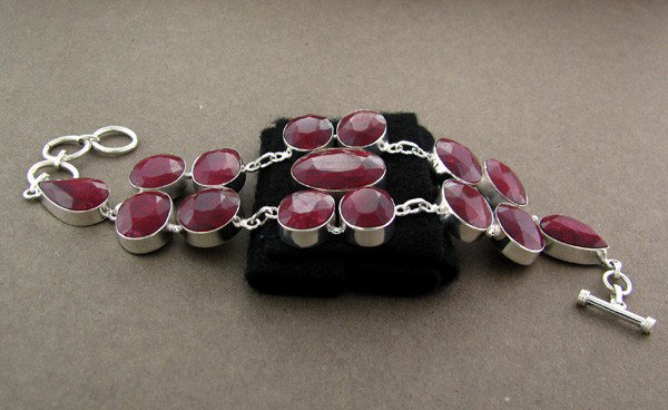 APP: 38.9k 171.51CT Ruby & Sterling Silver Bracelet: 171.51CT Ruby and Sterling Silver Bracelet - Appraisal Value: $38.8K - Bid with utmost confidence from GovernmentAuction.com. We have been in business for over 35 years, and pride ourselves on perfect