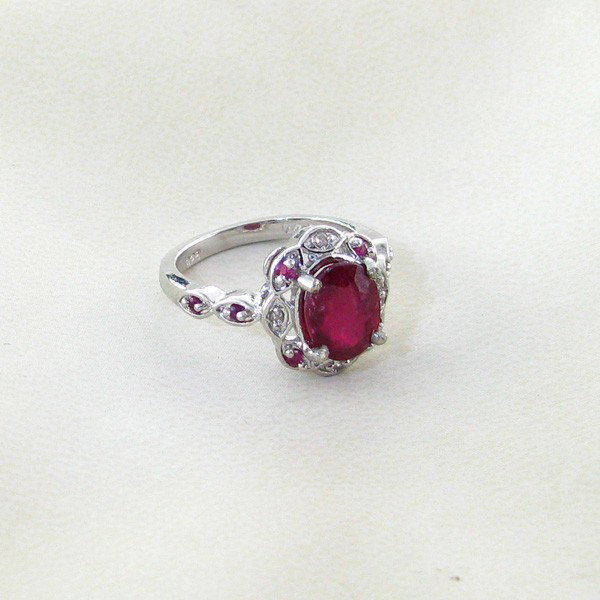 APP: 8k 2CT Ruby w/Diamonds & Plat Sterl Silver Ring: 2.84CT Ruby W/Diamonds and Platinum Overlay Sterling Silver Ring - Appraisal Value: $8.2K - Bid with utmost confidence from GovernmentAuction.com. We have been in business for over 35 years, and pride