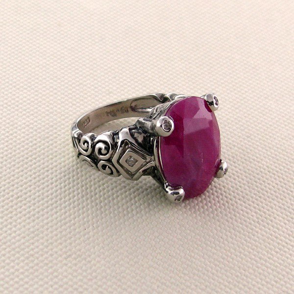 APP: 8k 11CT Ruby w/Diamonds & Plat Sterl Silver Ring: 11.80CT Ruby W/Diamonds and Platinum Overlay Sterling Silver Ring - Appraisal Value: $8.0K - Bid with utmost confidence from GovernmentAuction.com. We have been in business for over 35 years, and prid