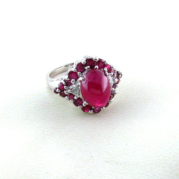 APP: 8k 5CTRuby & Platinum Overlay Sterling Silver Ring: 5.94CT Ruby and Platinum Overlay Sterling Silver Ring - Appraisal Value: $8.0K - Bid with utmost confidence from GovernmentAuction.com. We have been in business for over 35 years, and pride ourselves 