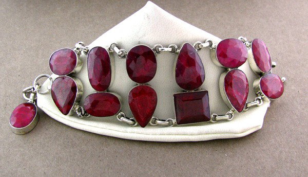 APP: 21.3k 146.63CT Ruby & Sterling Silver Bracelet: 146.63CT Ruby and Sterling Silver Bracelet - Appraisal Value: $21.2K - Bid with utmost confidence from GovernmentAuction.com. We have been in business for over 35 years, and pride ourselves on perfect