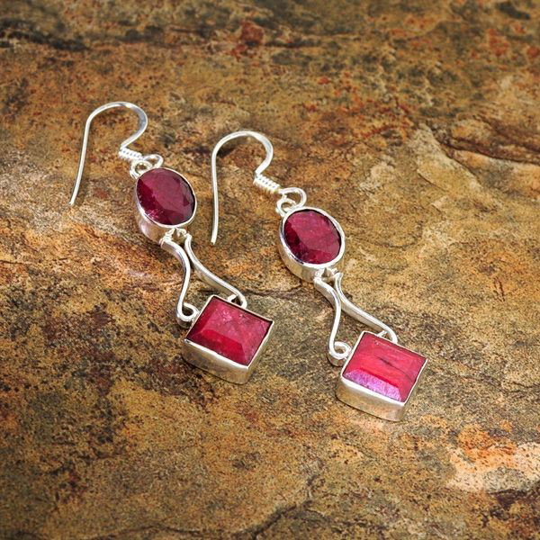 APP: 4.5k 9.30CT Ruby & Sterling Silver Earrings: 9.30CT Ruby and Sterling Silver Earrings - Appraisal Value: $4.4K - Bid with utmost confidence from GovernmentAuction.com. We have been in business for over 35 years, and pride ourselves on perfect cu