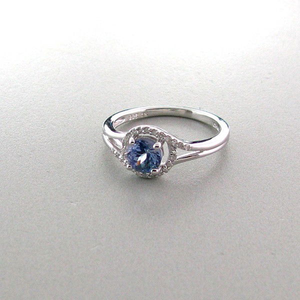 APP: 1k 18kt Gold/Silver 1CT Tanzanite/Diamond Ring: 18 kt. Gold and Silver Overlay, 1.00CT Tanzanite and Diamond Ring - Appraisal Value: $1.6K - Bid with utmost confidence from GovernmentAuction.com. We have been in business for over 35 years, and prid