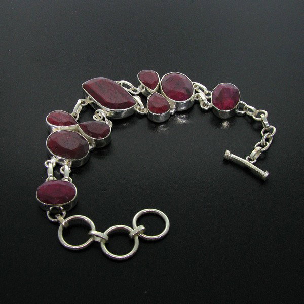 APP: 30.2k 57.34CT Ruby & Sterling Silver Bracelet: 57.34CT Ruby and Sterling Silver Bracelet - Appraisal Value: $30.1K - Bid with utmost confidence from GovernmentAuction.com. We have been in business for over 35 years, and pride ourselves on perfect 