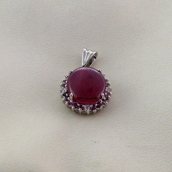 APP: 6k 9CT Ruby & Platinum Sterling Silver Pendant: 9.28CT Ruby and Platinum Overlay Sterling Silver Pendant - Appraisal Value: $6.3K - Bid with utmost confidence from GovernmentAuction.com. We have been in business for over 35 years, and pride ourselv