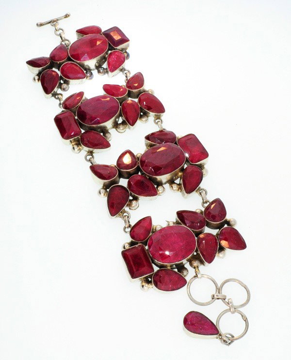 APP: 28.5k 221.69CT Ruby & Sterling Silver Bracelet: 221.69CT Ruby and Sterling Silver Bracelet - Appraisal Value: $28.5K - Bid with utmost confidence from GovernmentAuction.com. We have been in business for over 35 years, and pride ourselves on perfect