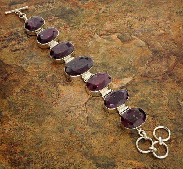 APP: 22.5k 127.77CT Ruby & Sterling Silver Bracelet: 127.77CT Ruby and Sterling Silver Bracelet - Appraisal Value: $22.5K - Bid with utmost confidence from GovernmentAuction.com. We have been in business for over 35 years, and pride ourselves on perfect