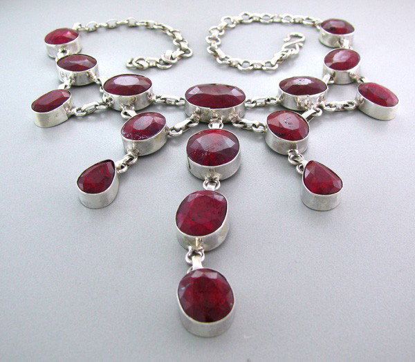 APP: 24.2k 161.46CT Ruby & Sterling Silver Necklace: 161.46CT Ruby and Sterling Silver Necklace - Appraisal Value: $24.1K - Bid with utmost confidence from GovernmentAuction.com. We have been in business for over 35 years, and pride ourselves on perfect