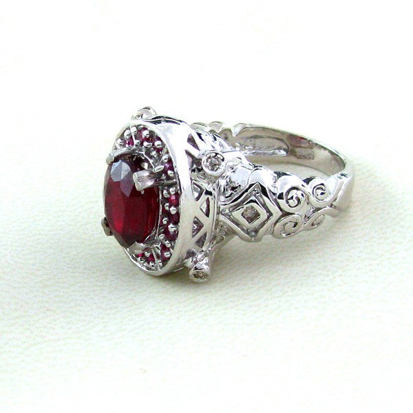 APP: 6k 3.33CT Ruby w/Diamond & Sterling Silver Ring: 3.33CT Ruby W/ Diamond and Sterling Silver Ring - Appraisal Value: $5.9K - Bid with utmost confidence from GovernmentAuction.com. We have been in business for over 35 years, and pride ourselves on per