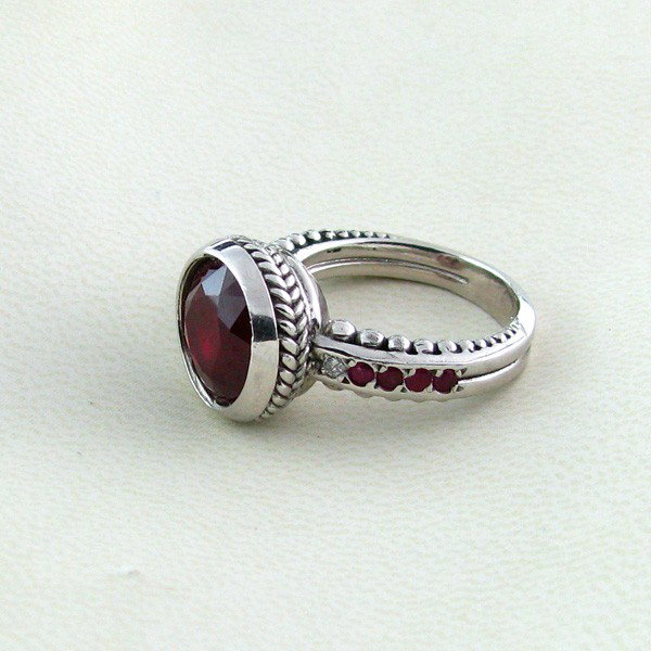 APP: 8.7k 7.91CT Ruby w/Diamond & Sterling Silver Ring: 7.91CT Ruby W/ Diamond and Sterling Silver Ring - Appraisal Value: $8.7K - Bid with utmost confidence from GovernmentAuction.com. We have been in business for over 35 years, and pride ourselves on per