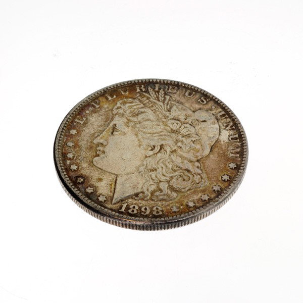 1898 U.S. Morgan Silver Dollar Coin - Investment: 1898 U.S. Morgan Silver Dollar Coin - Bid with utmost confidence from GovernmentAuction.com. We have been in business for over 35 years, and pride ourselves on perfect customer service.
