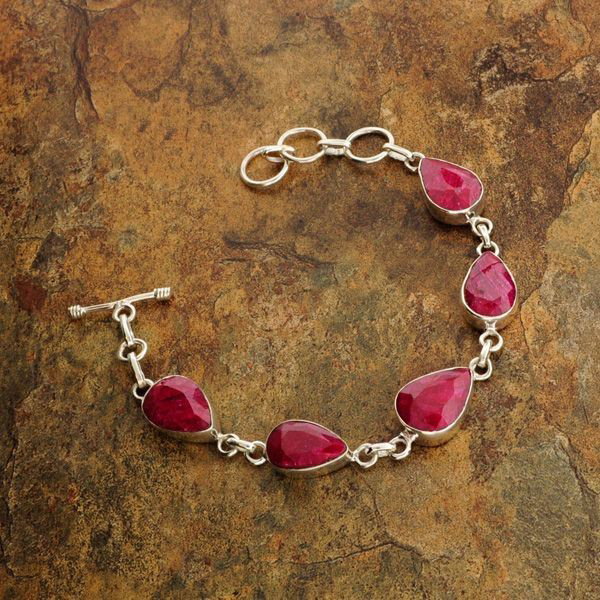 APP: 11.5k 29.61CT Ruby & Sterling Silver Bracelet: 29.61CT Ruby and Sterling Silver Bracelet - Appraisal Value: $11.4K - Bid with utmost confidence from GovernmentAuction.com. We have been in business for over 35 years, and pride ourselves on perfect 