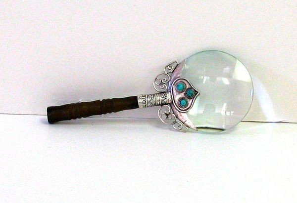 Small Hand Magnifying Glass w/Jade Handle: Small Hand Magnifying Glass with Jade Handle - Bid with utmost confidence from GovernmentAuction.com. We have been in business for over 35 years, and pride ourselves on perfect customer service.