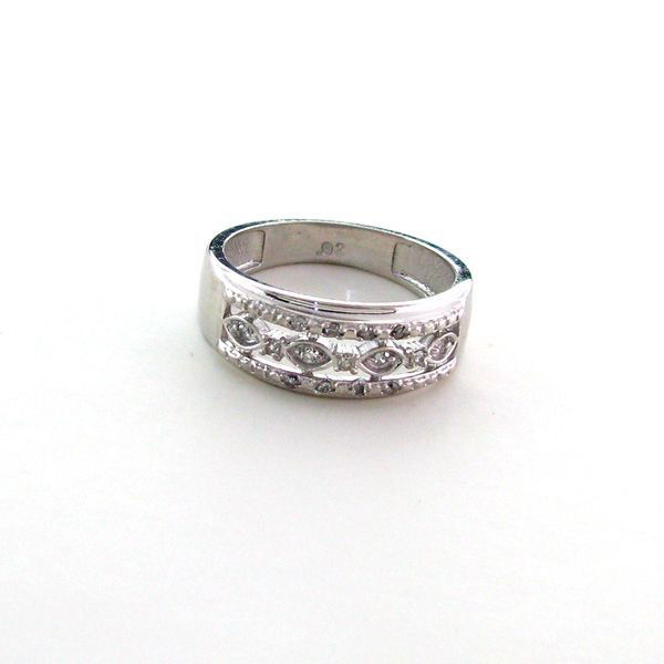 APP: 1k 18kt White Gold & Silver, Diamond Ring: 18 kt. White Gold Overlay and Silver, 0.15CT Diamond Ring - Appraisal Value: $1.1K - Bid with utmost confidence from GovernmentAuction.com. We have been in business for over 35 years, and pride oursel