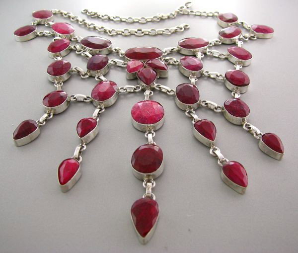 APP: 38.9k 264.32CT Ruby & Sterling Silver Necklace: 264.32CT Ruby and Sterling Silver Necklace - Appraisal Value: $38.9K - Bid with utmost confidence from GovernmentAuction.com. We have been in business for over 35 years, and pride ourselves on perfect