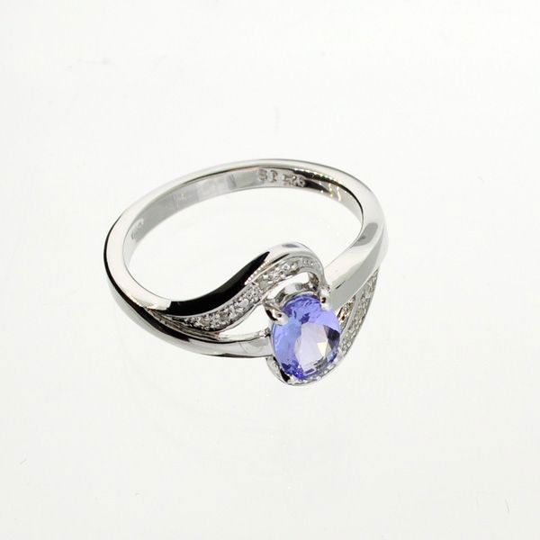 APP: 1.8k 18kt Silver, 0.59CT Tanzanite & Diamond Ring: 18 kt. Silver, 0.59CT Tanzanite and Diamond Ring - Appraisal Value: $1.8K - Bid with utmost confidence from GovernmentAuction.com. We have been in business for over 35 years, and pride ourselves on pe