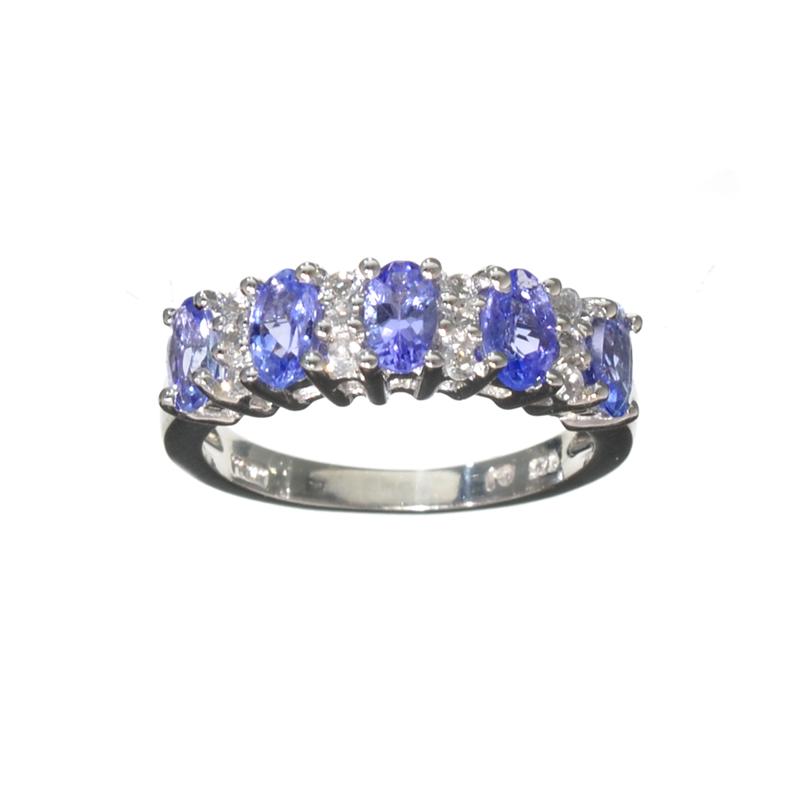 1.31CT Oval Cut Tanzanite And White Topaz Over Sterling Silver Ring: Gov. File: H-17514 1.31CT Oval Cut Tanzanite And White Topaz Over Sterling Silver Ring Retail Replacement Value: $1.3K Asset Type: Sterling Silver Ring Shipping: $19.95