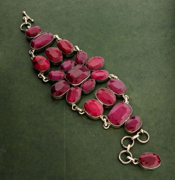 APP: 31.6k 187.52CT Ruby & Sterling Silver Bracelet: 187.52CT Ruby and Sterling Silver Bracelet - Appraisal Value: $31.5K - Bid with utmost confidence from GovernmentAuction.com. We have been in business for over 35 years, and pride ourselves on perfect