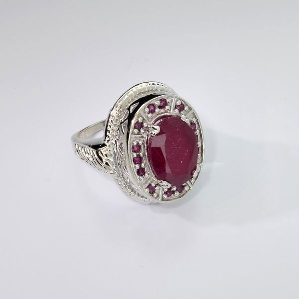 APP: 10.9k 9.86CT Ruby & Sterling Silver Ring: 9.86CT Ruby and Sterling Silver Ring - Appraisal Value: $10.9K - Bid with utmost confidence from GovernmentAuction.com. We have been in business for over 35 years, and pride ourselves on perfect custo