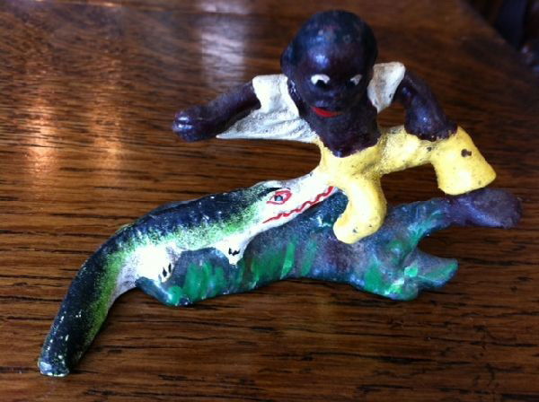 Cast Iron Figure: Cast Iron Figure- Thank you for viewing this Item. We hope that you are successful in your bidding. For over 30 years we have given the best possible customer service to our 1000's of repeat buyers.