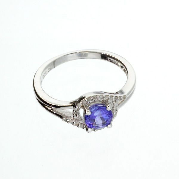 APP: 2k 18kt White Gold/Silver 1CT Tanz Diamonds Ring: 18 kt. White Gold Overlay and Silver, 1.00CT Tanzanite and Diamonds Ring - Appraisal Value: $2.3K - Bid with utmost confidence from GovernmentAuction.com. We have been in business for over 35 years, a