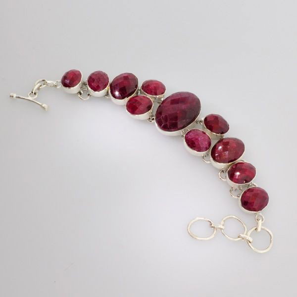 APP: 26k 94.72CT Ruby & Sterling Silver Bracelet: 94.72CT Ruby and Sterling Silver Bracelet - Appraisal Value: $26.0K - Bid with utmost confidence from GovernmentAuction.com. We have been in business for over 35 years, and pride ourselves on perfect 