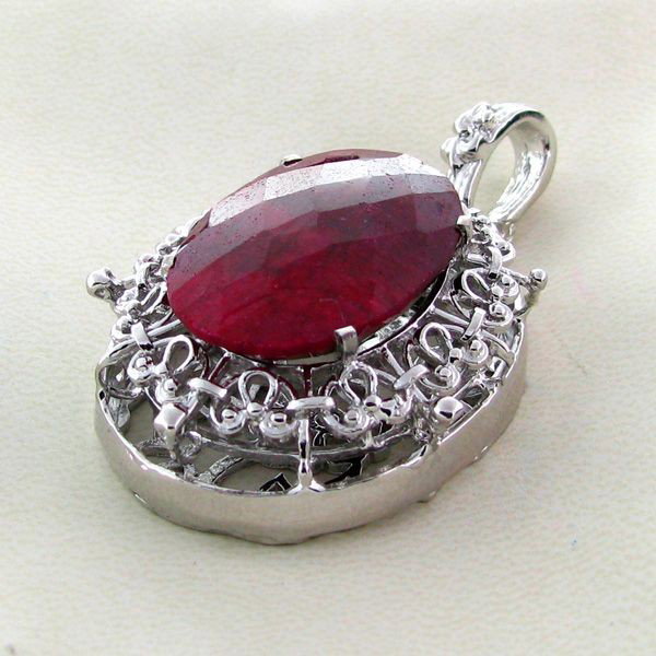 APP: 5k 36.94CT Ruby & Sterling Silver Pendant: 36.94CT Ruby and Sterling Silver Pendant - Appraisal Value: $4.9K - Bid with utmost confidence from GovernmentAuction.com. We have been in business for over 35 years, and pride ourselves on perfect cu