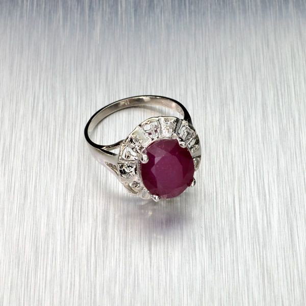 APP: 9.3k 6.90CT Ruby & Sterling Silver Ring: 6.90CT Ruby and Sterling Silver Ring - Appraisal Value: $9.2K - Bid with utmost confidence from GovernmentAuction.com. We have been in business for over 35 years, and pride ourselves on perfect custom