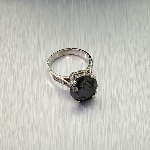 APP: 10k 14kt White Gold, 5k Diamond Ring : 14 kt. White Gold, 5.31CT Rare Black Diamond Ring Ring - Appraisal Value: $10.5K - Bid with utmost confidence from GovernmentAuction.com. We have been in business for over 35 years, and pride ourselve