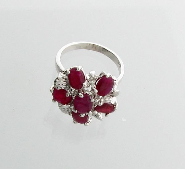 APP: 8.4k 4.83CT Oval Cut Ruby & Sterling Silver Ring: 4.83CT Oval Cut Ruby and Sterling Silver Ring - Appraisal Value: $8.3K