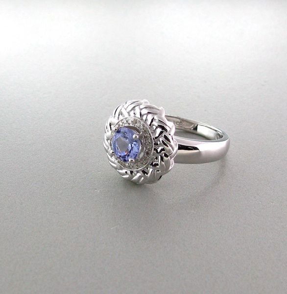 APP: 1k 18kt White Gold/Silver Tanzanite/Diamond Ring: 18 kt. White Gold Overlay and Silver, 0.70CT Tanzanite and Diamond Ring - Appraisal Value: $1.8K