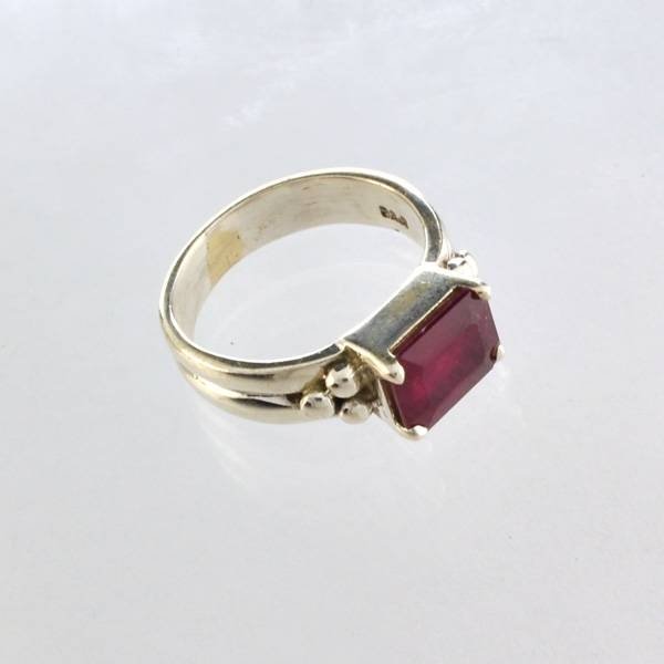APP: 4k Sebastian 2CT Emerald Cut Ruby & Silver Ring: Designer Sebastian 2.88CT Emerald Cut Ruby and Sterling Silver Ring - Appraisal Value: $4.0K </