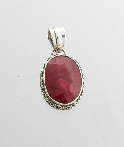 APP: 2k 12CT Oval Cut Ruby & Sterling Silver Pendant: 12.82CT Oval Cut Ruby & Sterling Silver Pendant - Appraisal Value: $1.9K