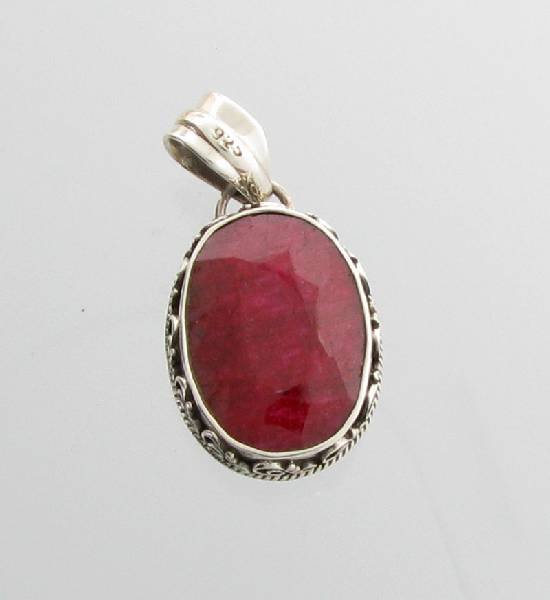 APP: 3k 15CT Oval Cut Ruby & Sterling Silver Pendant: 15.67CT Oval Cut Ruby & Sterling Silver Pendant - Appraisal Value: $3.1K