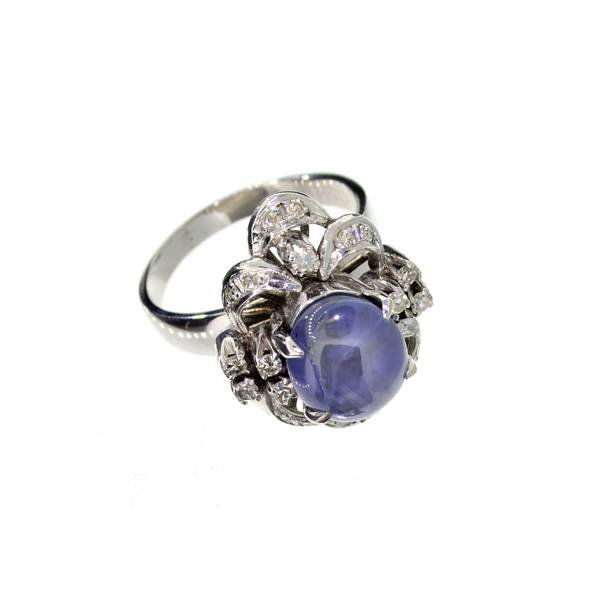 APP: 4k 18kt White Gold 5CT Sapphire & Diamond Ring: 18 kt. White Gold, 5.15CT Oval Cabochon Cut Star Sapphire and 0.40CT Diamond Ring - Appraisal Value: $4.3K