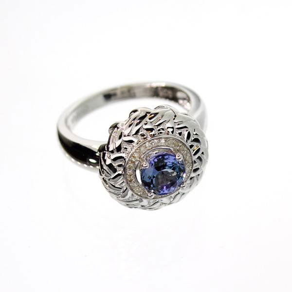 APP: 2k 18kt Gold & Silver Tanzanite & Diamonds Ring: 18 kt. Gold and Silver Overlay, 0.73CT Tanzanite and Diamonds Ring - Appraisal Value: $2.1K