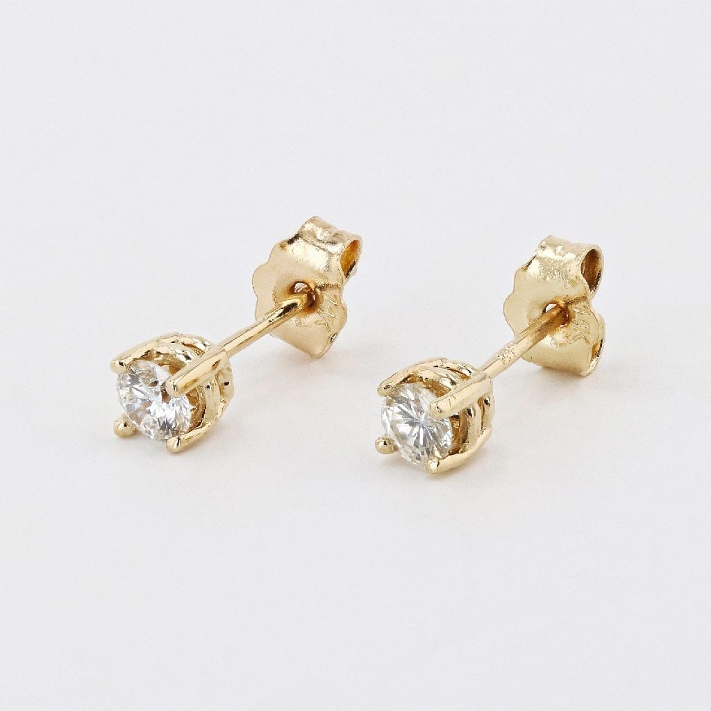 14KT Yellow Gold 0.25CT Diamond Stud Earrings: Gov. File: H-83689 14KT Yellow Gold 0.25CT Diamond Stud Earrings Asset Type: 14KT Earrings Shipping: $19.95