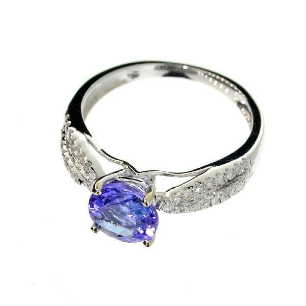 APP: 8k 18kt White Gold, 1CT Tanzanite & Diamond Ring: 18 kt. White Gold, 1.63CT Round Cut Tanzanite and Diamond Ring - Appraisal Value: $7.9K