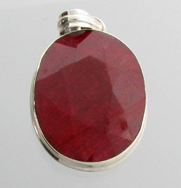 APP: 4k 33.42CT Oval Cut Ruby & Sterling Silver Pendant: 33.42CT Oval Cut Ruby & Sterling Silver Pendant - Appraisal Value: $4.7K