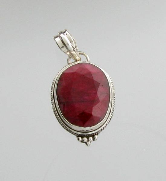 APP: 2k 19.48CT Oval Cut Ruby & Sterling Silver Pendant: 19.48CT Oval Cut Ruby & Sterling Silver Pendant - Appraisal Value: $2.8K